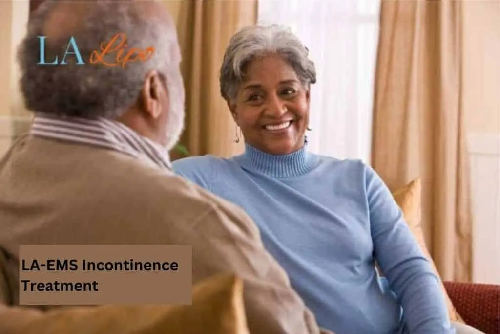 Couple sat smiling at each other - LA-EMS treatment White City