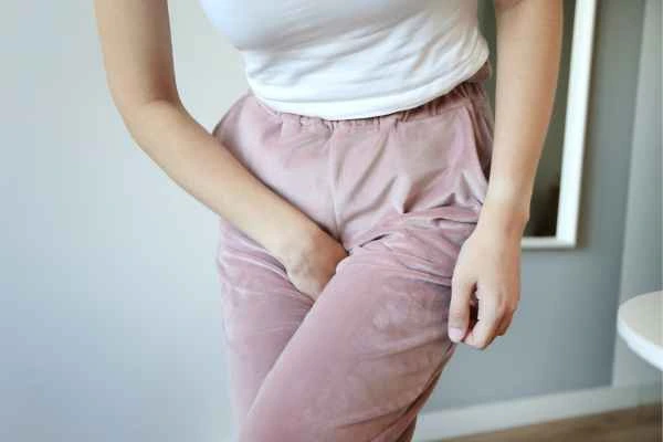 woman struggling with urine incontinence White City