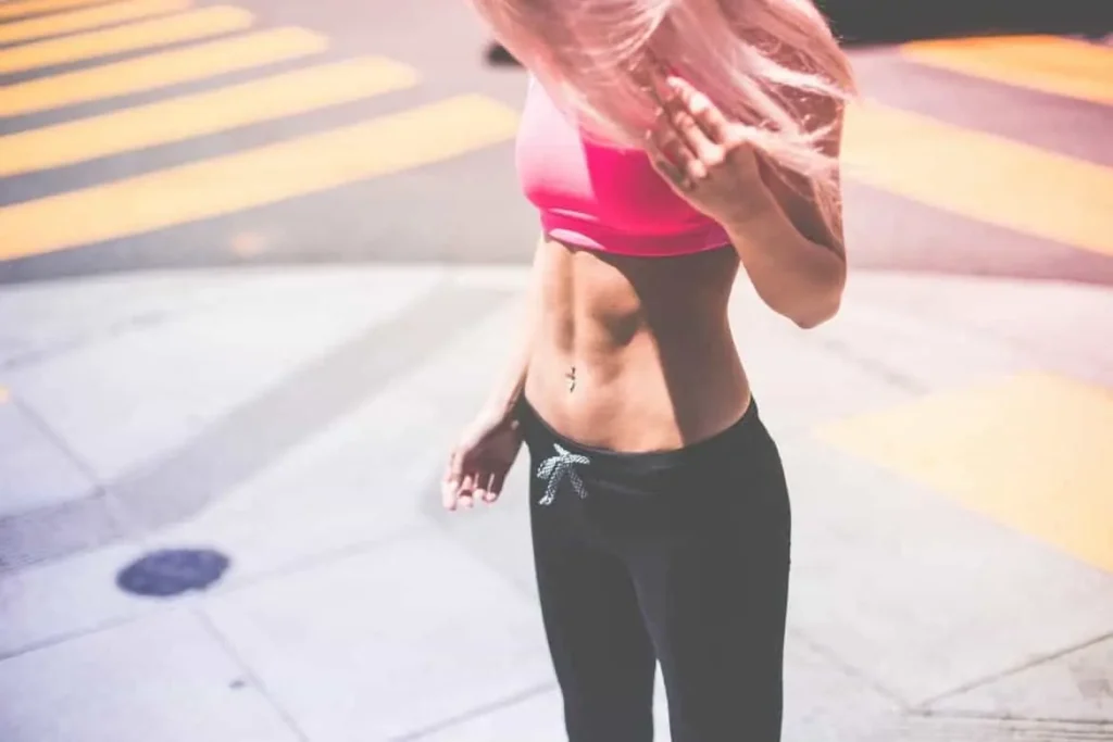 Woman with toned stomach after LA-EMS Body Sculpting Treatment White City